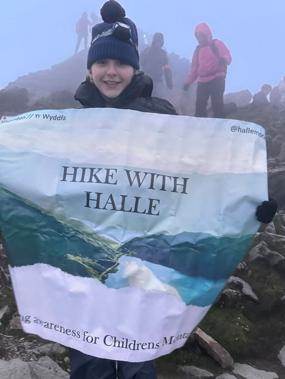 Halle with poster.jpg