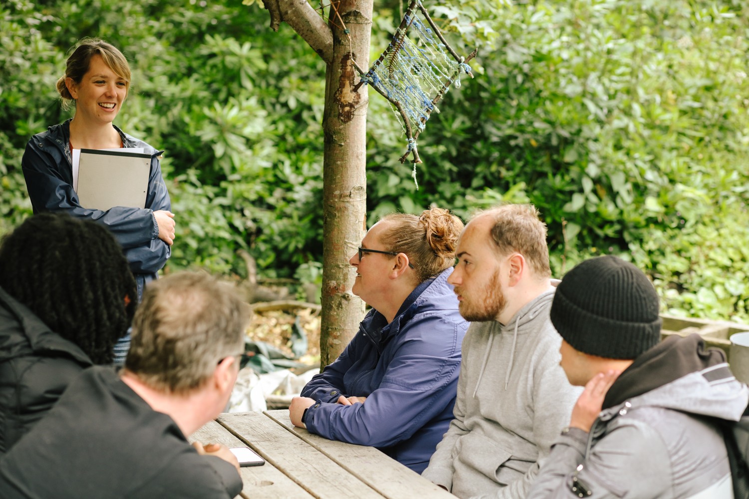 Dr Natasha Goakes (stood at the back) talks to one of the groups.jpg