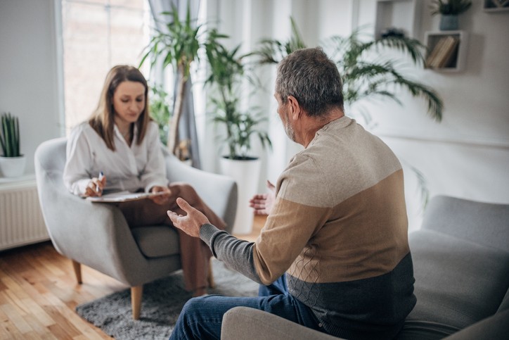 Older man receives mental health support.jpg