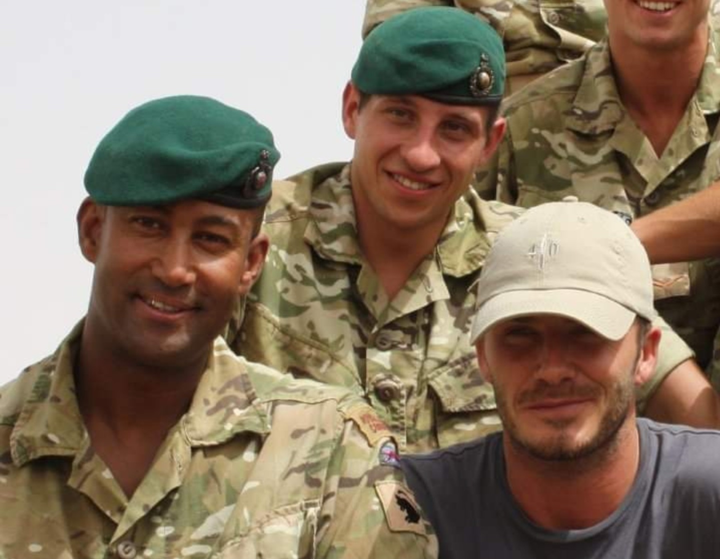 Troy during his time in the Marines, next to David Beckham