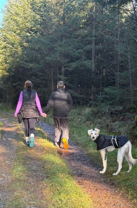 Simon and partner walking Rodney.jpg