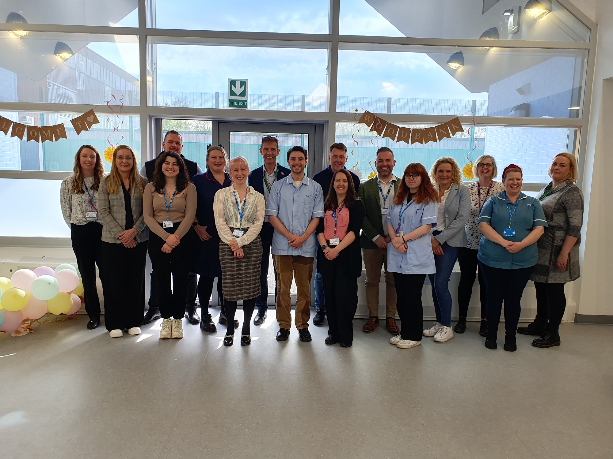 Members of the Woodbank team, with visitors who attended a pre-opening tour