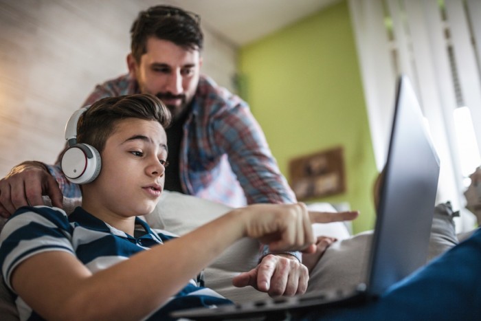 Young person using a laptop.jpg