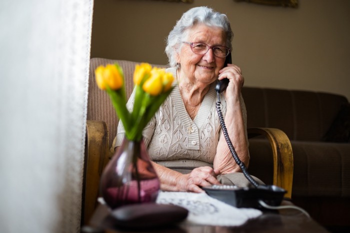 Happy older woman on phone.jpg