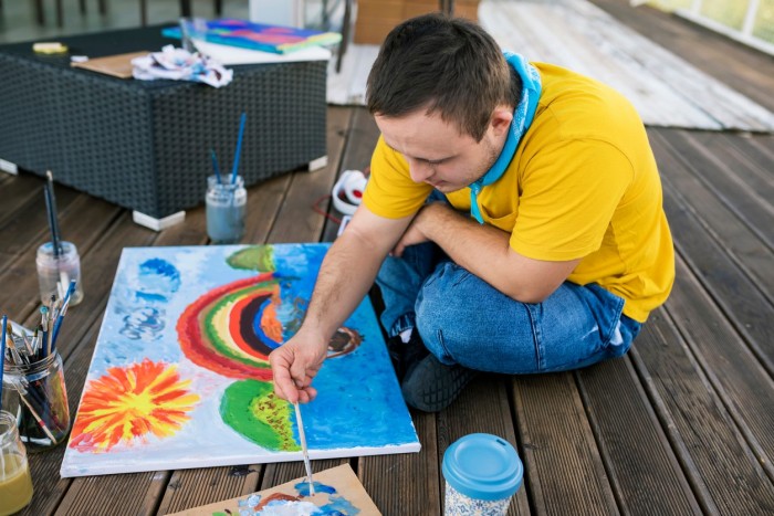 Young man painting.jpg